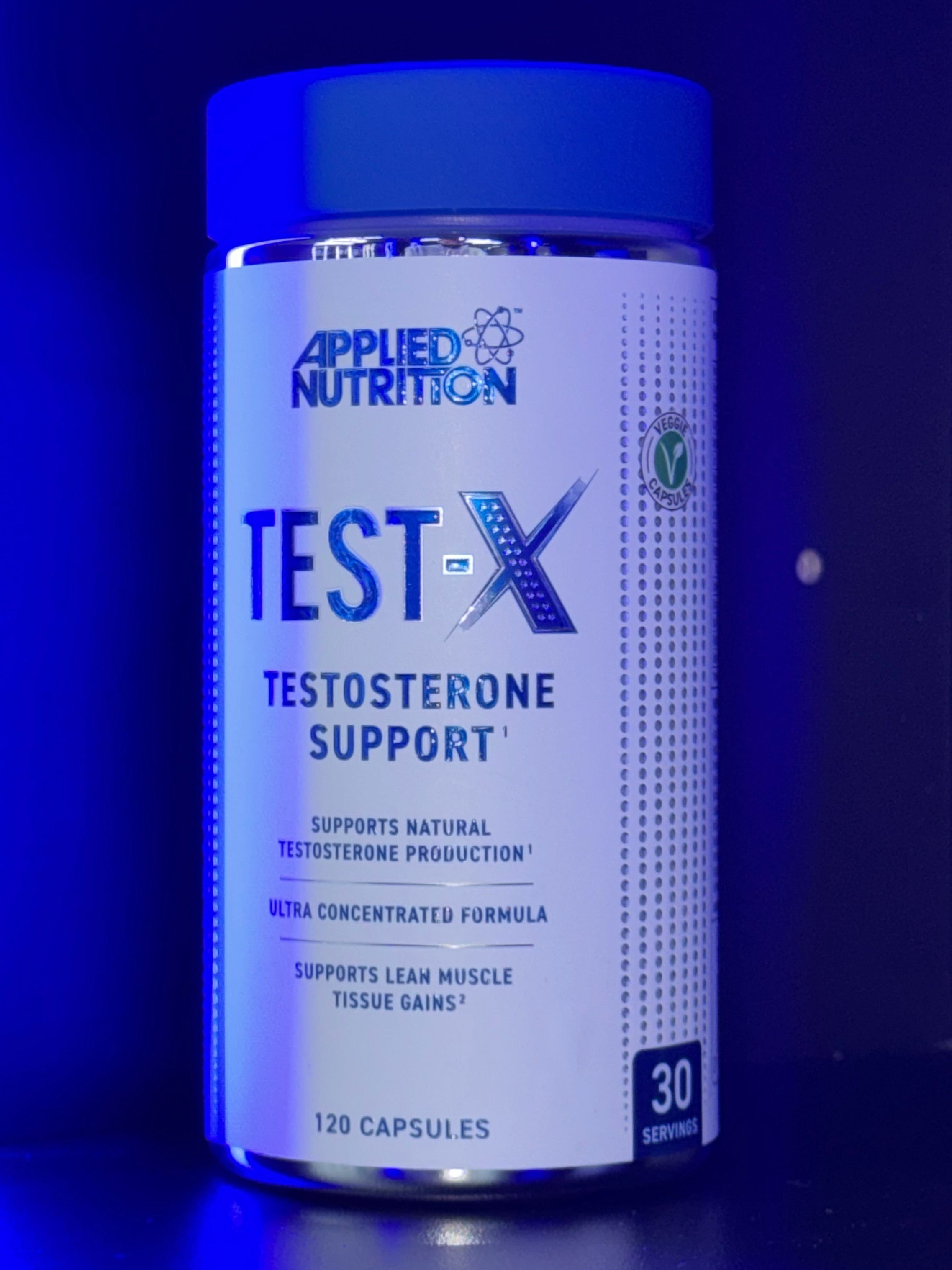 Supplement bottle labeled 'TEST-X' on a blue background
